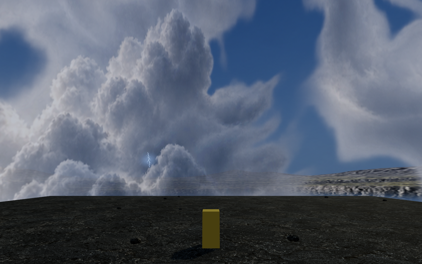 Small branching lightning above distant terrain, with clouds and a yellow reference block